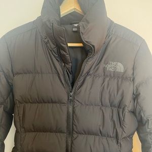 The North Face Black Metropolis water repellent 550 fill power down parka.